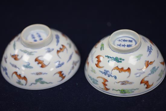 A pair of Chinese doucai bat bowls, Yongzheng mark, Republic period, D. 9.7cm, one bowl restored